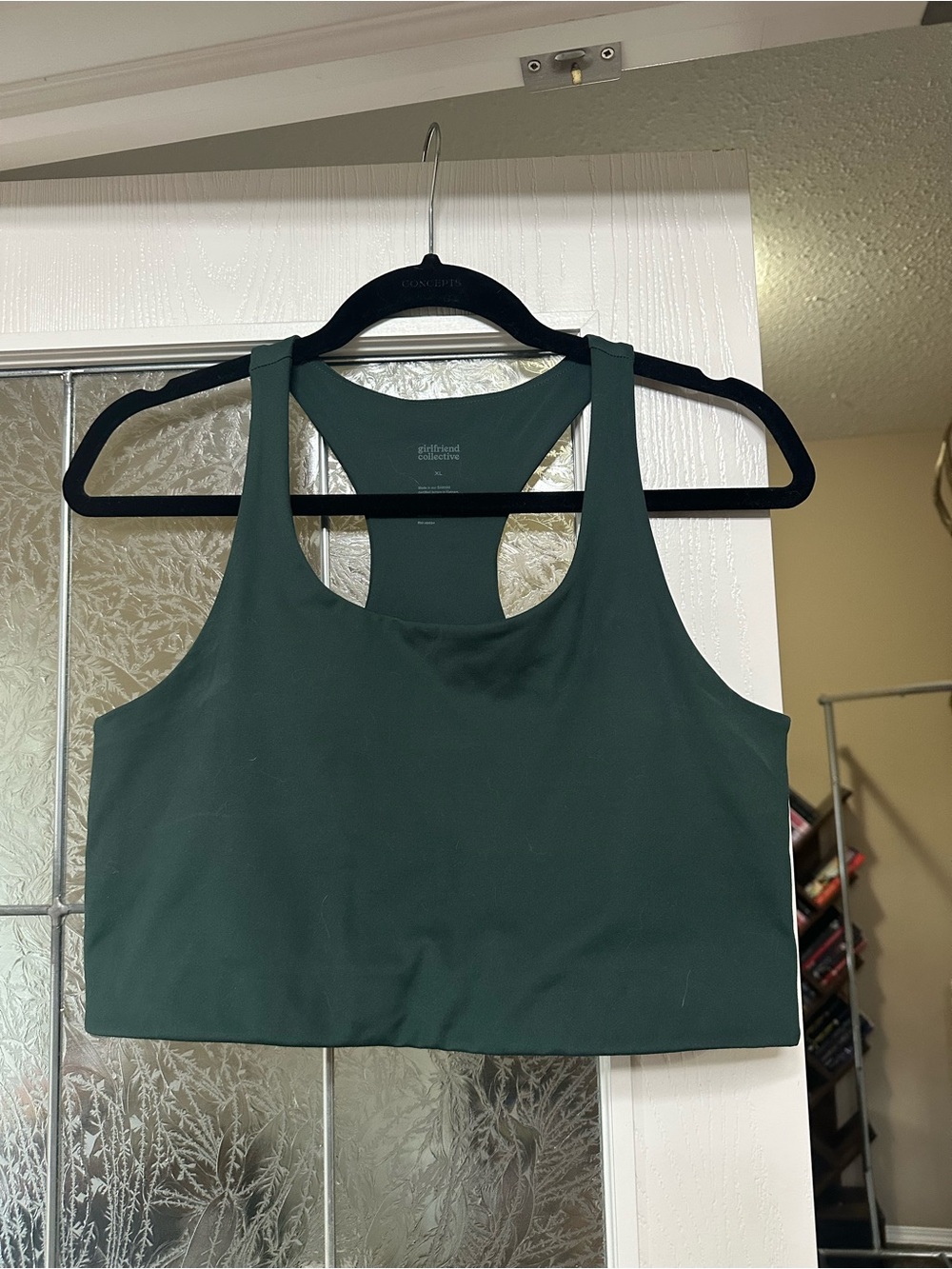 girlfriend collective deep green racerback sports bra